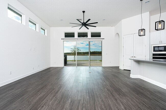 Building Photo - Luxurious Solar Powered 4 Bedroom, 3 Bath Waterfront Home with office & Upgrades Galore!