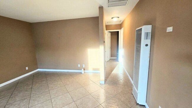 Building Photo - Mixed Used Residential and Commercial- Large Back Yard with Rolling Gate