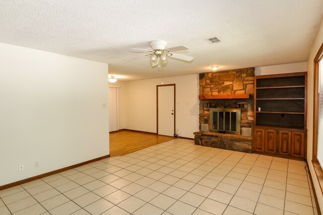 Building Photo - Two Bedroom, 2 Bath, 1-Car Garage, 1179 sq ft feet home with wood burning fireplace. and screened...