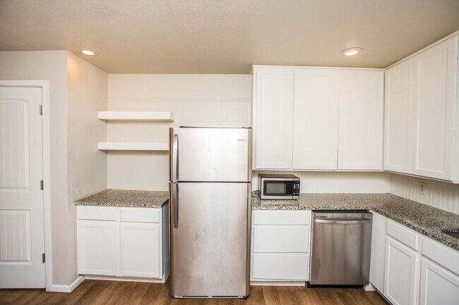Building Photo - "Charming 4-Bedroom Home with Granite Touches & Gleaming Hardwood Floors in Lubbock!"