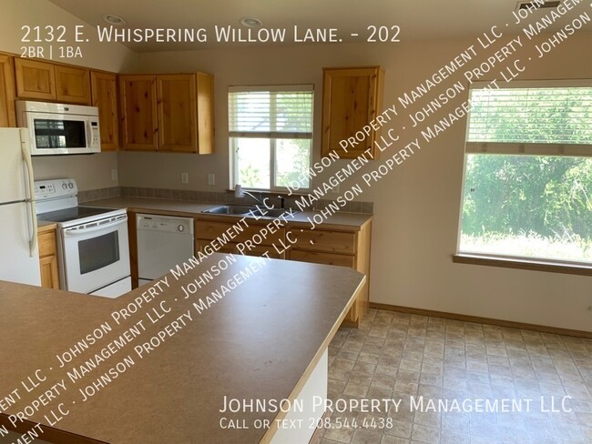 Building Photo - Whispering Willow Apartments: Modern, Conv...