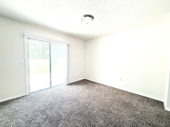 Building Photo - Spacious 4BR Home with Large Fenced Yard & Community Pool
