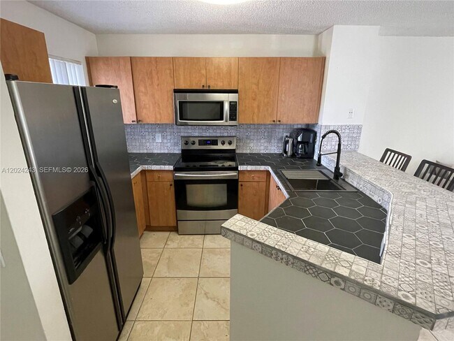 Building Photo - 8750 N Sherman Cir