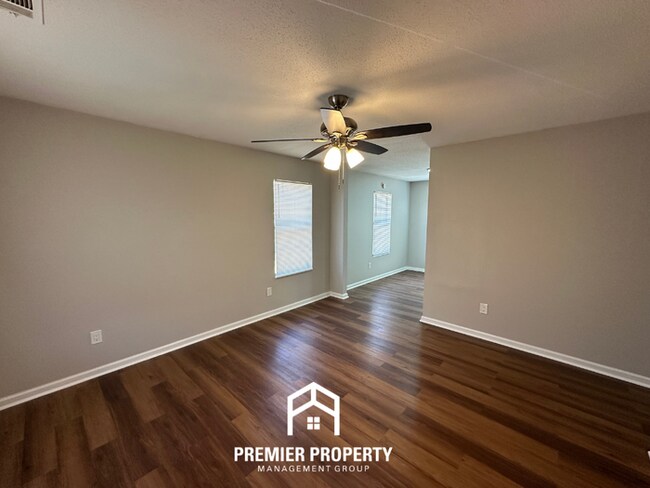 Building Photo - Spacious 4BR/2BA Home in 38141 | Vinyl Flooring & Large Fenced Backyard