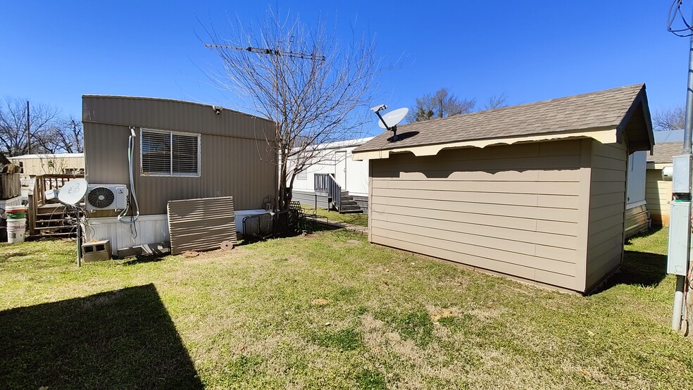 Back yard with storage bldg - 7905 Harwell St