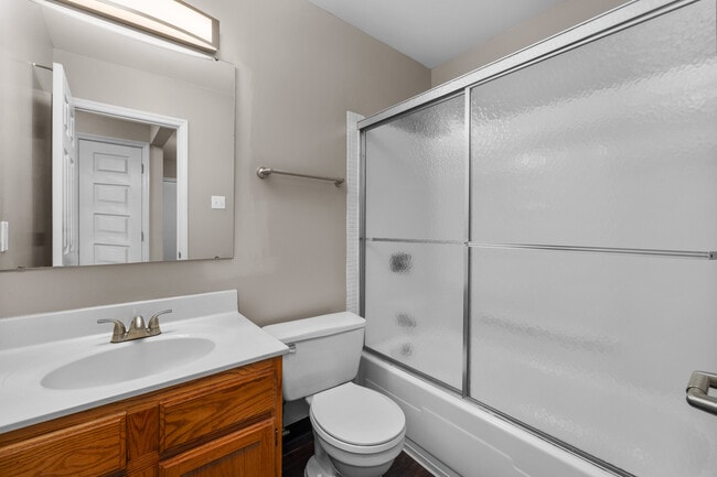 Two Bedroom Garden Partial Remodel with Fireplace | Bathroom Interior - Woods Mill Park Apartments & Townhomes