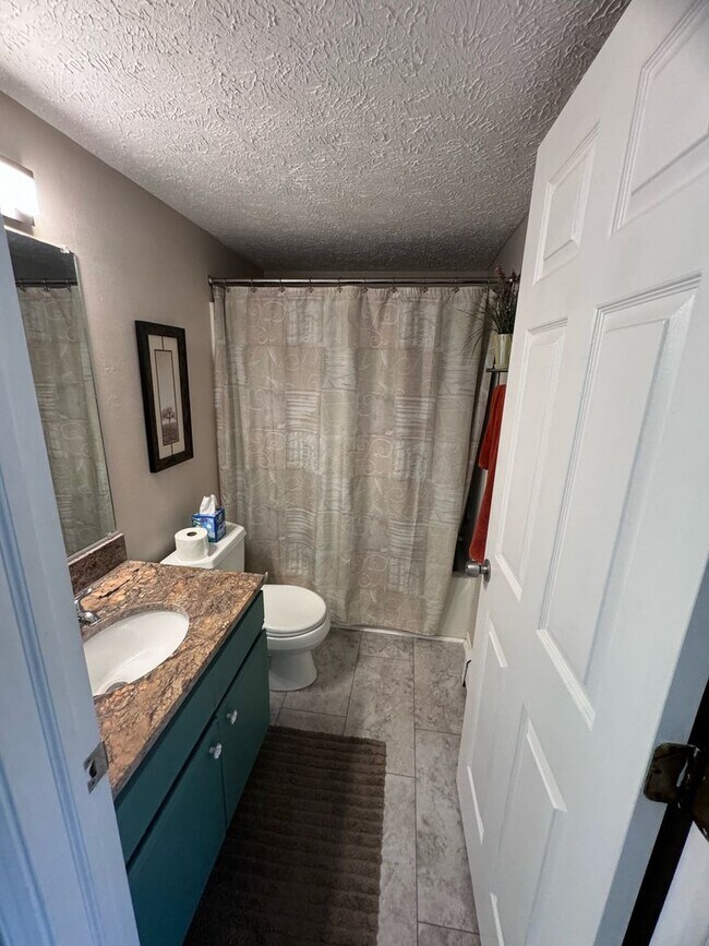 Building Photo - 3 BEDROOM CONDO WITH A 1 CAR GARAGE AND INCLUDES UTILITIES!