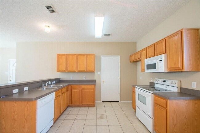 Building Photo - 6316 Downeast Dr