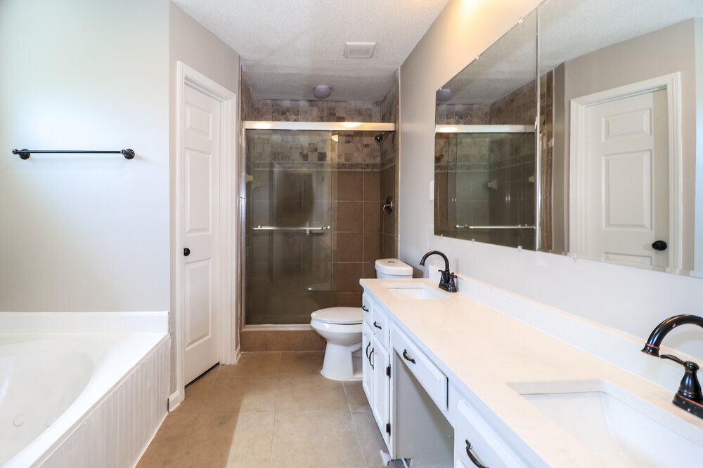Building Photo - 8144 Creekside Cir N