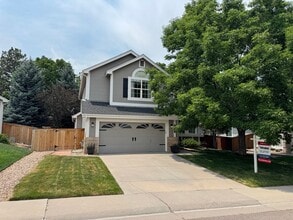 Building Photo - Available for Rent in Lone Tree's Desirable Carriage Club Neighborhood!