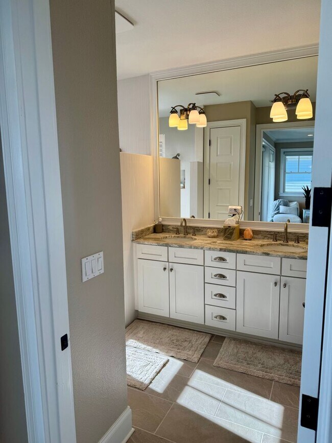 Building Photo - Waterfront Shell Point Home with Dock, Hot Tub, Elevator, & Golf Cart