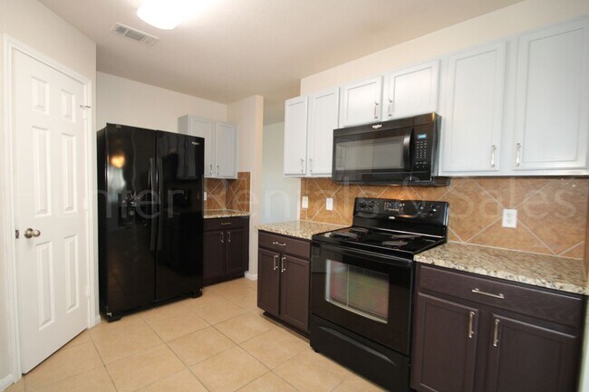 Building Photo - 6712 Taree Loop