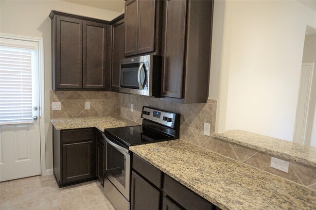 Building Photo - 12950 Shady Grove Ln