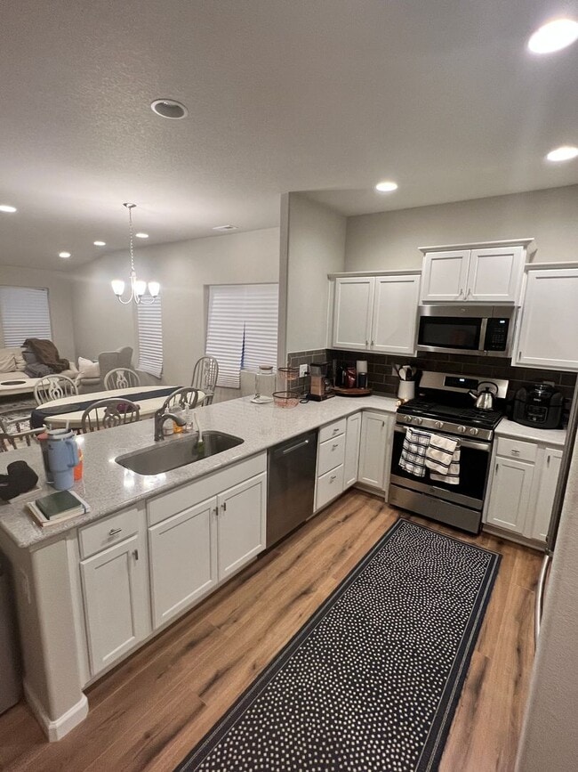 Building Photo - $1995 | 2BR/2.5BA | Lovely New Townhome in...