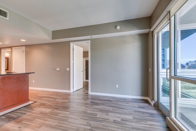 Building Photo - Iconic Strip-View Luxury | Elegant 1BR + Den High-Rise Residence