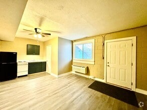 Building Photo - All Utilities Included! Weekly Rates Avail...