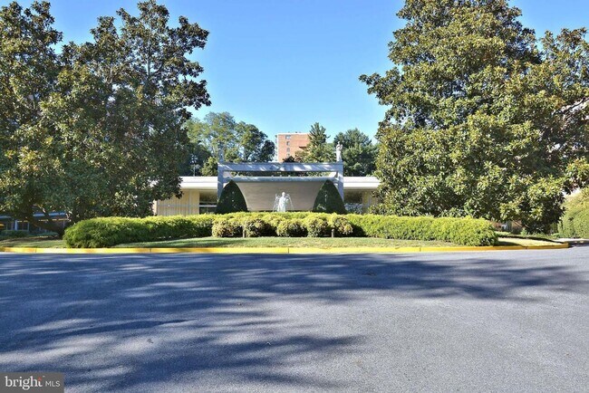 Building Photo - Welcome to The Towers!! This gem of a studio is nestled in a quiet neighborhood in Wesley Heights.