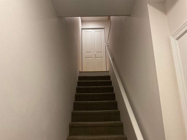 Building Photo - Riverfront Townhome with Tandem Garage & Fenced Yard