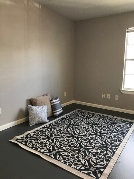 Spacious main living and dining area - 222 S Kansas Ave