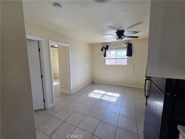 Building Photo - 7888 N Maple Ave