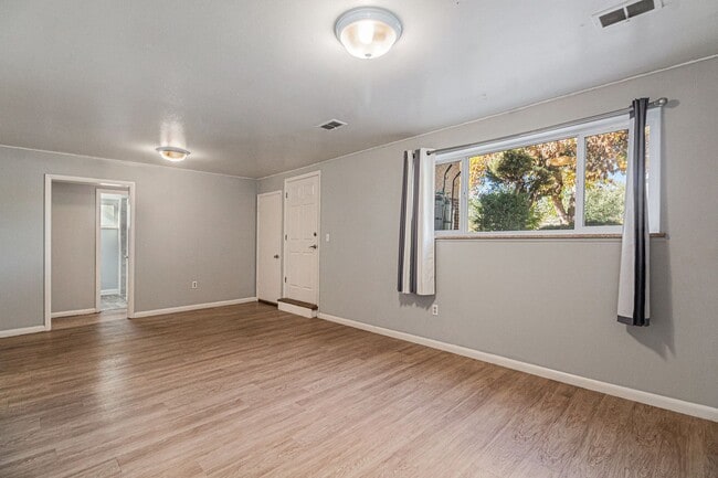 Building Photo - 7360 W.20th Ave. Unit B