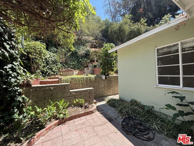Building Photo - 1938 N Beverly Glen Blvd