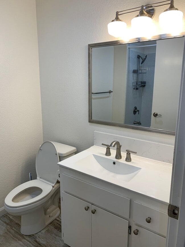 Building Photo - updated condo in central location