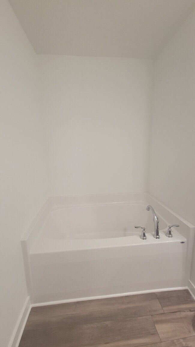 Building Photo - One free month with 18-month lease!!!  "Charming 3-Bed Townhouse Retreat with Granite Elegance in...