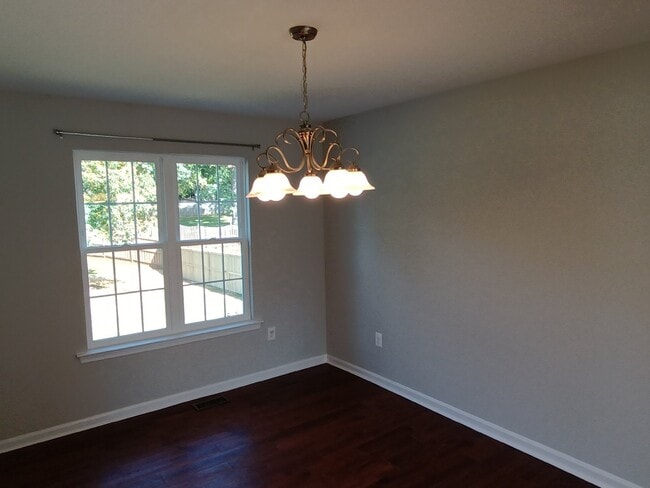 Building Photo - This charming 1,732-square-foot single-family home offers 3 bedrooms and 3 bathrooms, featuring a...
