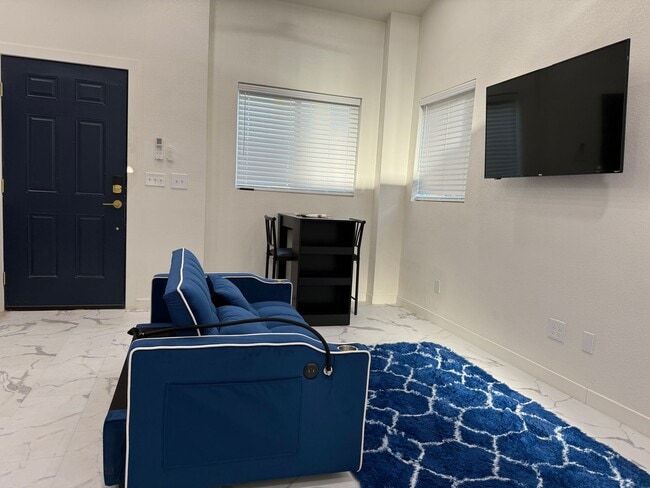 Building Photo - PRE LEASE NOW! Fully Furnished Loft ADU with Pool Access !