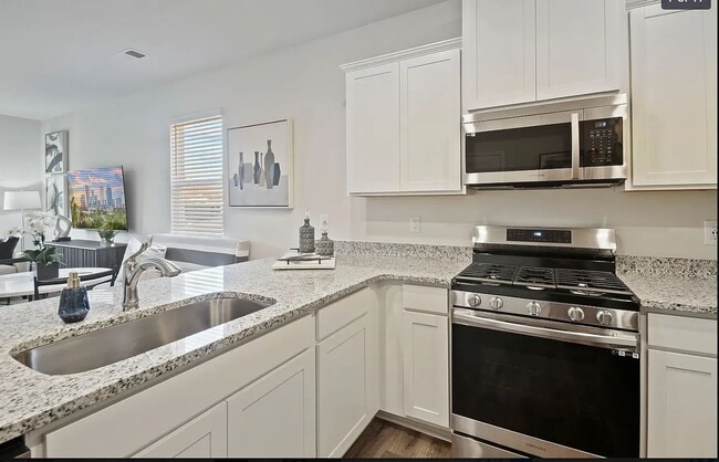 Building Photo - Large 3 Bedroom Townhome Coming Soon!