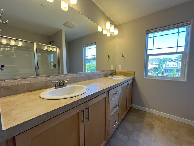 Building Photo - Modern 4-Bedroom Home on Large Corner Lot ...