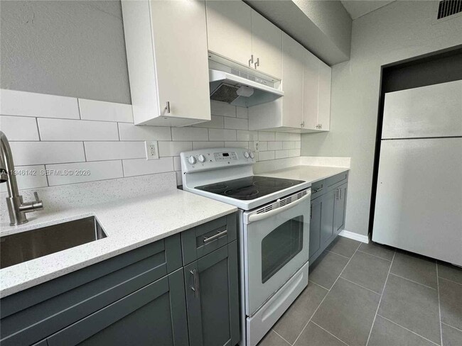 Building Photo - 8444 NW 4th Ave