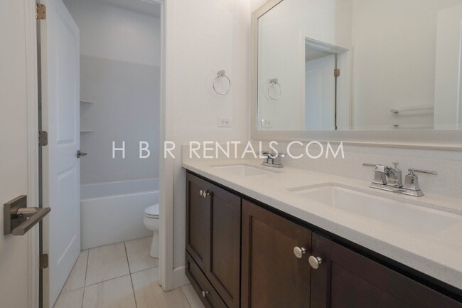 Building Photo - Hansen Village: Spacious 4-Bed Two Story H...