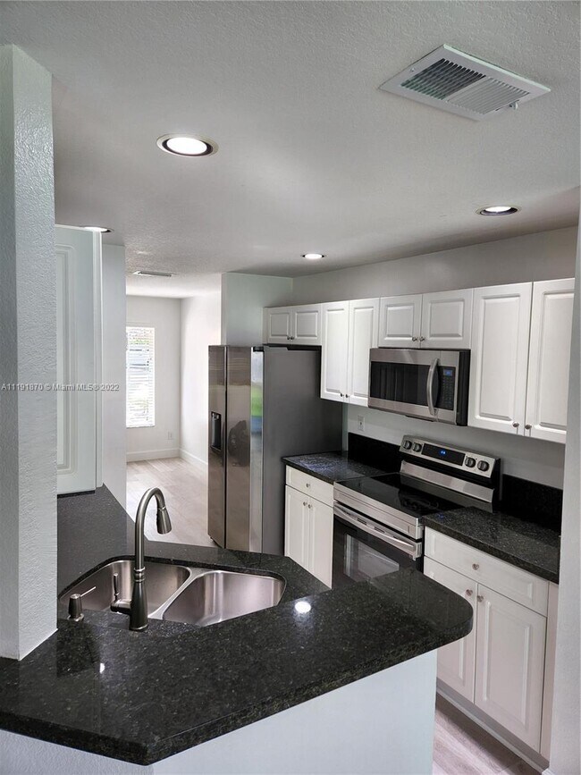 Building Photo - 2940 NW 99th Ter