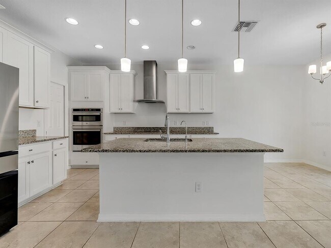 Building Photo - 7323 Pool Compass Loop