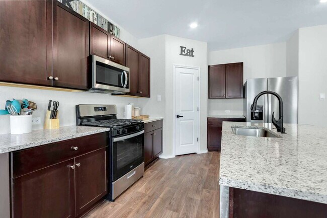 Building Photo - "Charming 4-Bedroom Retreat with Spacious ...