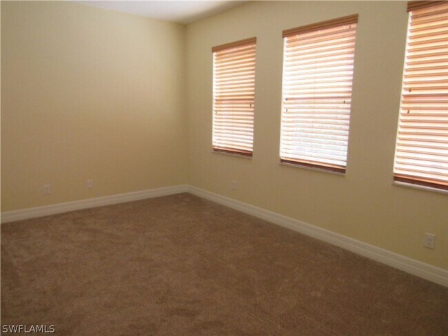 Building Photo - For Lease – Spacious 4-Bedroom Coach Home in Avalon Preserve