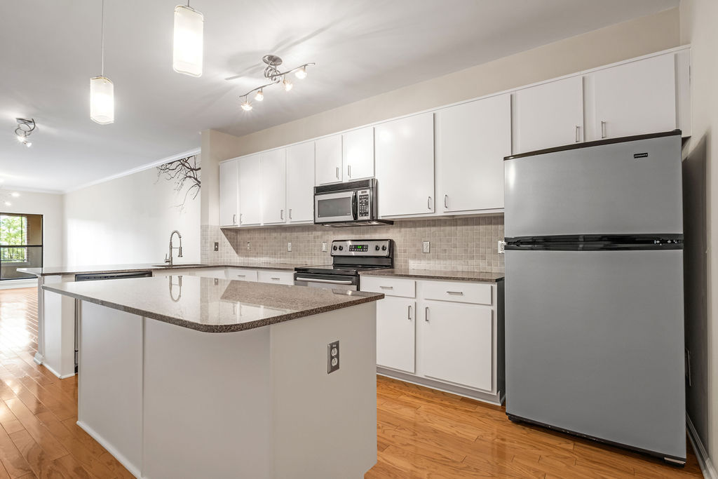 Large island with penty of cabinet space - 1803 Broadway