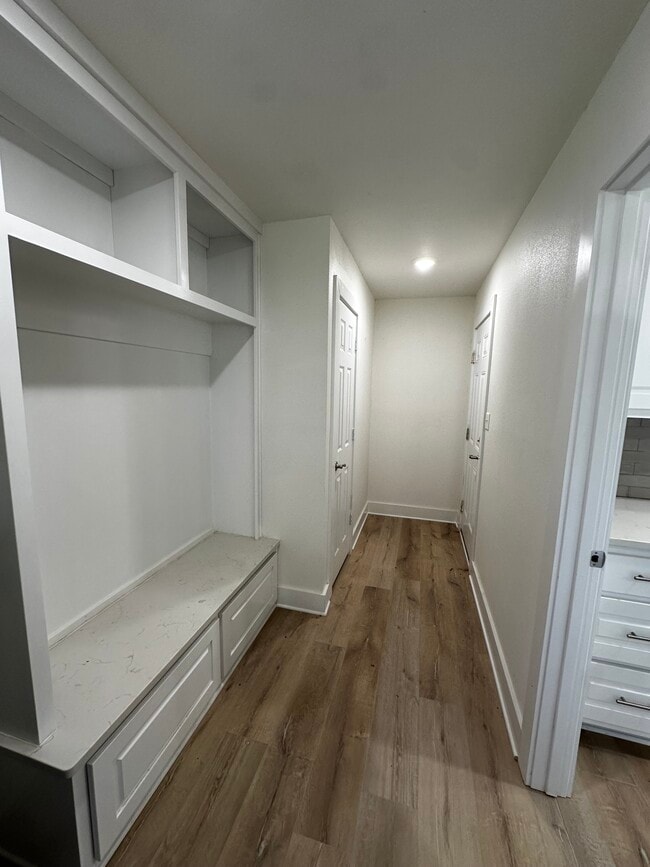 Large mudroom with built in storage, pantry, and w/d - 4714 29th St