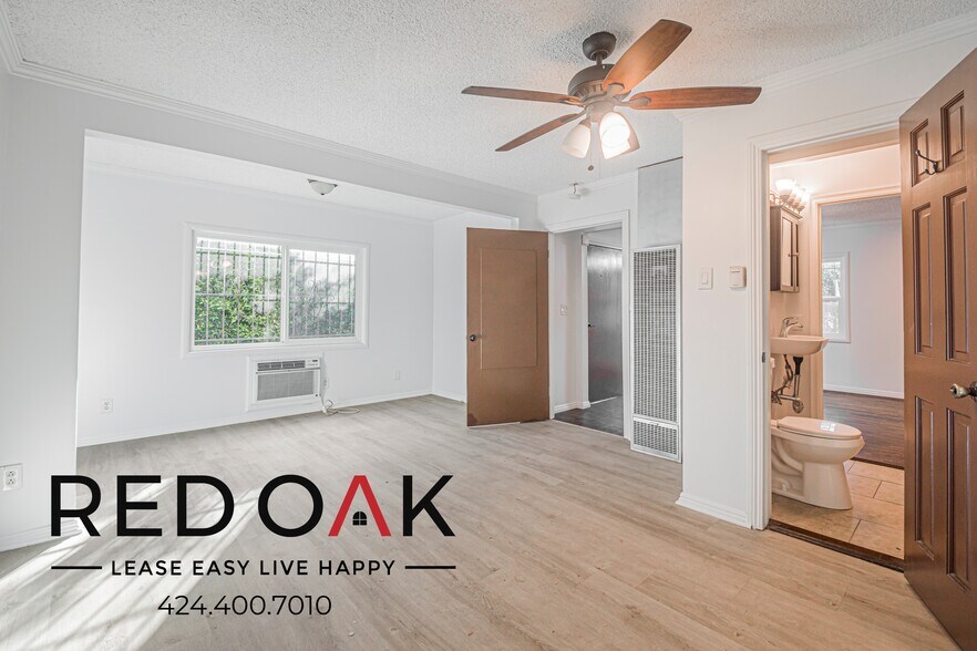 Building Photo - 1309 W 36th Pl