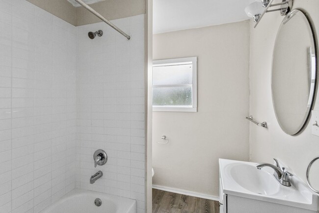 Building Photo - 3 Bed/2 Bath **Spiral Staircase, Split Level w/ NEW Bottom Floor Addition & LOTS of Extras** Redu...