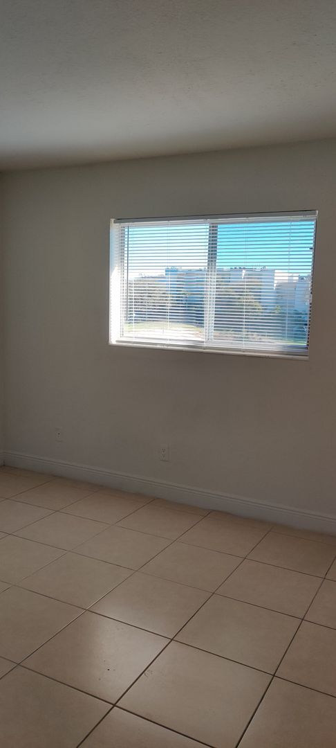 Building Photo - Newport Condominiums - 201