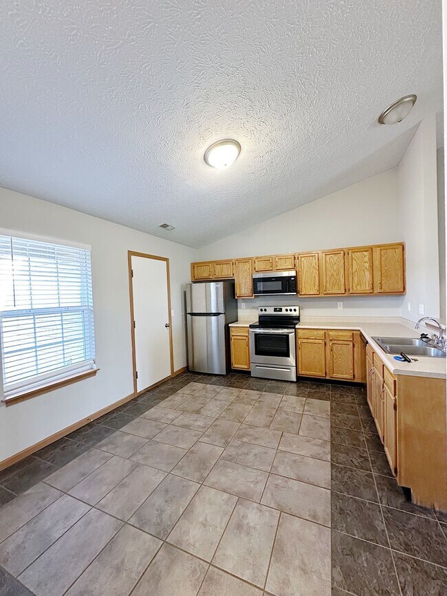 Building Photo - STUNNING Pond Views in this 2-Bed, 2-Bath Duplex