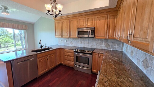 Building Photo - Golf Course Living in a Gated Harbor Hills Country Club – Lady Lake, FL