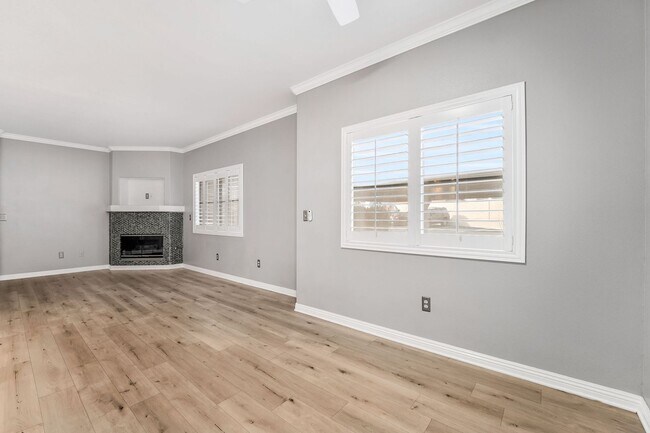 Building Photo - Light-Filled Dual-Suite Condo with Soaring Ceilings, Fireplace & Private Balcony in Amenity-Rich ...