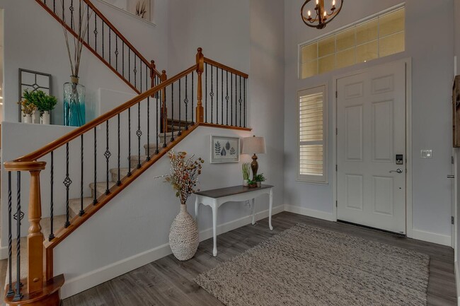 You'll love the towering entryway and open feel of this spacious Reno property - 1698 Gemtown Dr