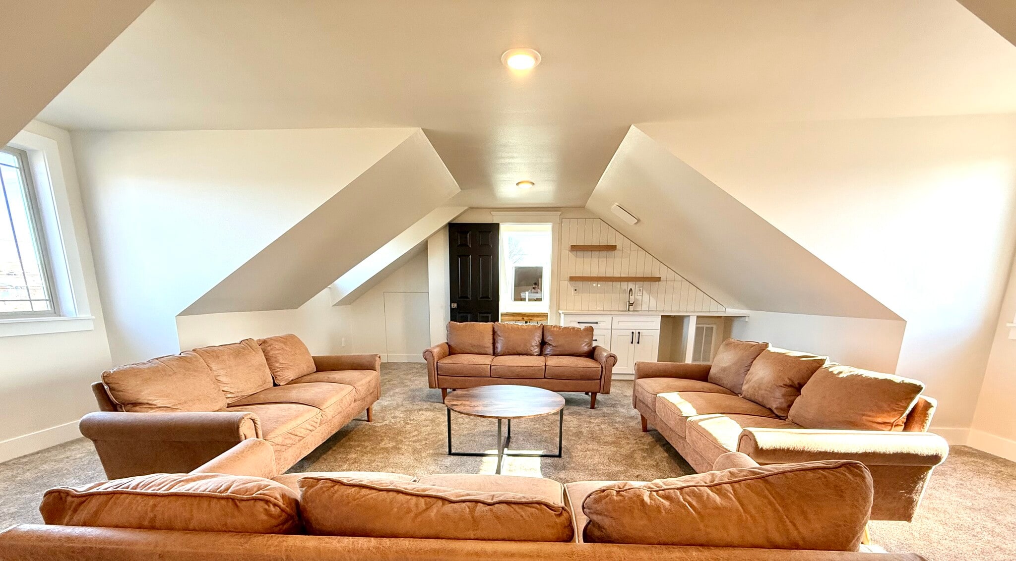 Loft looking toward wet bar and bathroom - 24 Ash St N