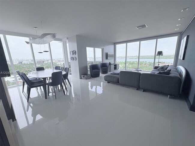 Building Photo - 10275 Collins Ave