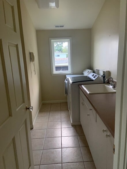Upstairs laundry room - 7117 Beach Dr SW